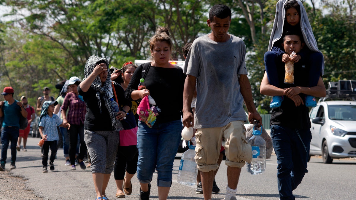Central American migrants on a road in Tapachula, Chiapas State, Mexico, Thursday. (AP Photo/Isabel Mateos)