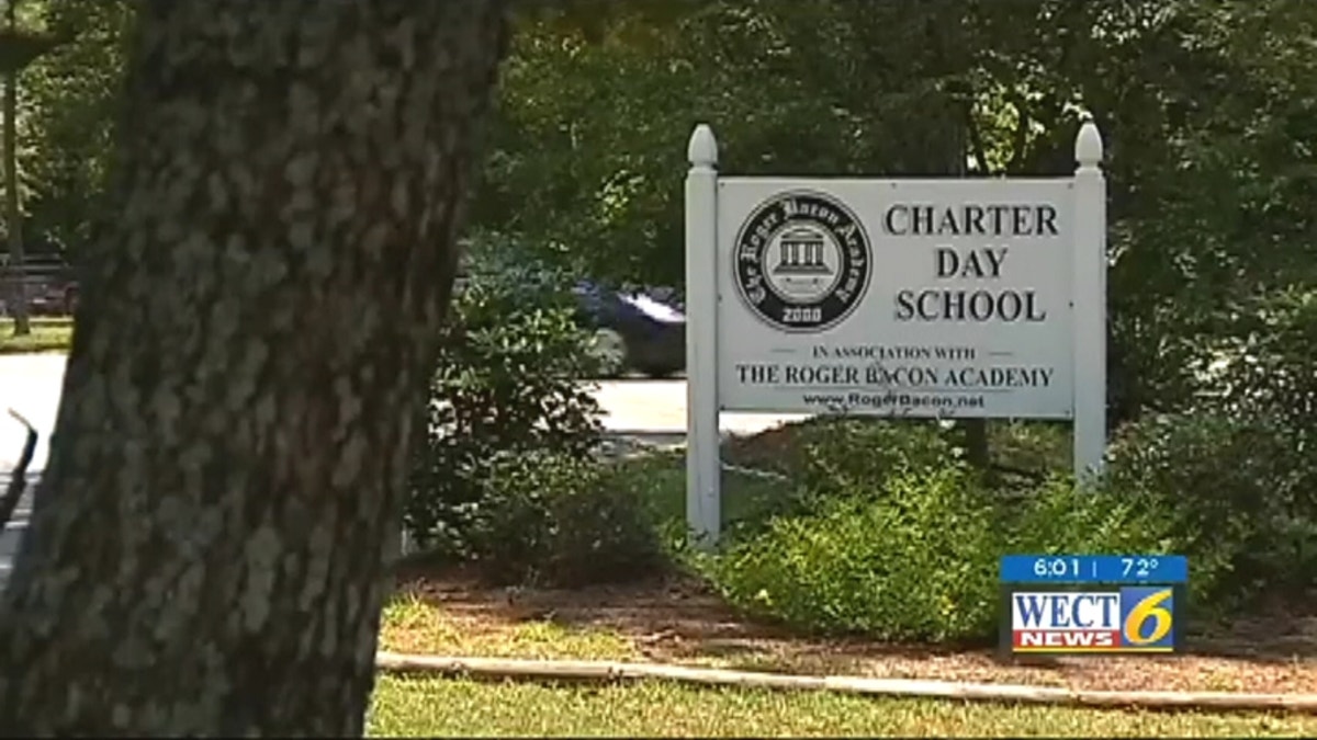 Students run outside of school as Charter Day dress code was recently deemed unconstitutional