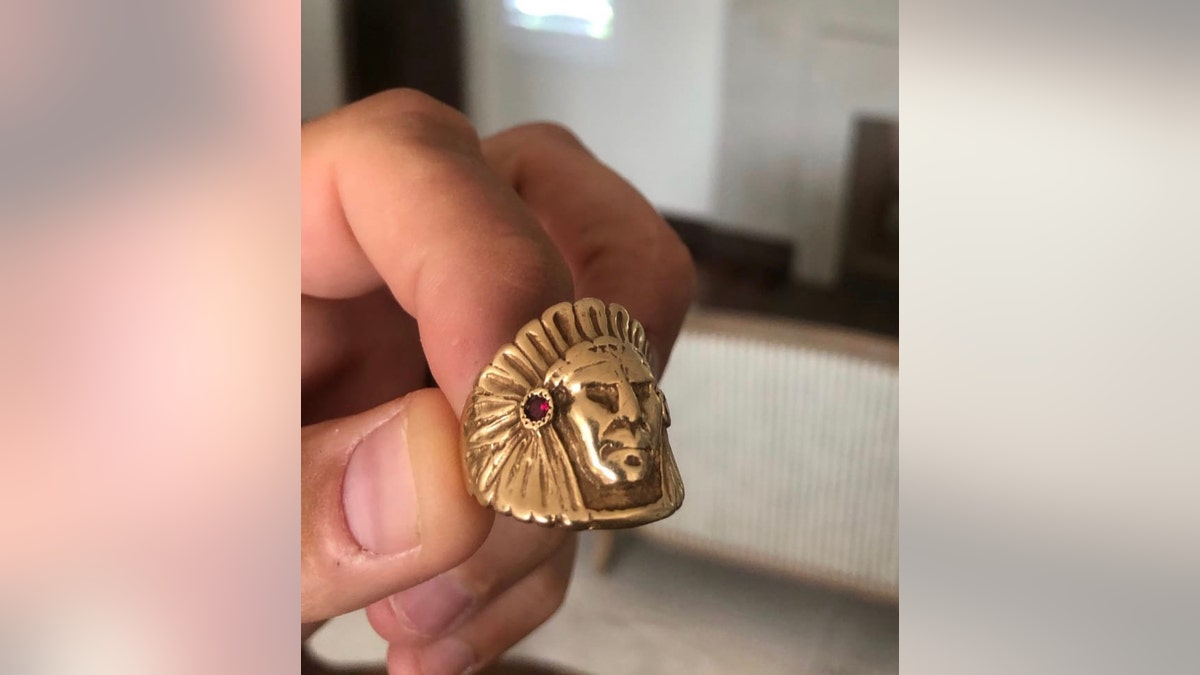 Brady Cobb said this ring, a 24-carat, ruby-adorned Indian head, was given to his father for moving more than a million pounds of marijuana for Pablo Escobar.
