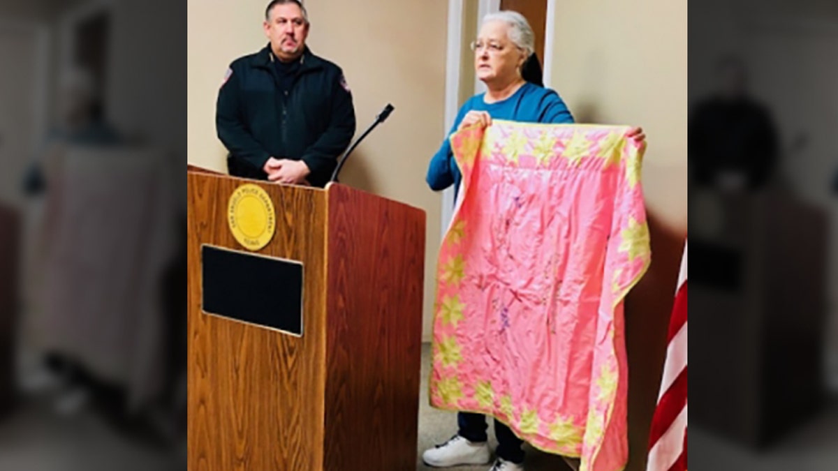 At a news conference Tuesday, Pam Guess, a relative of Dykes, showed reporters a blanket Dykes made for her when she was pregnant. 