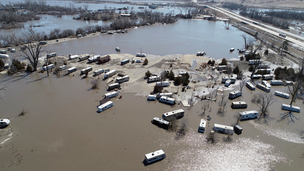 This Wednesday, March 20, 2019 aerial photo shows flooding near the Platte River in in Plattsmouth, Neb., south of Omaha.