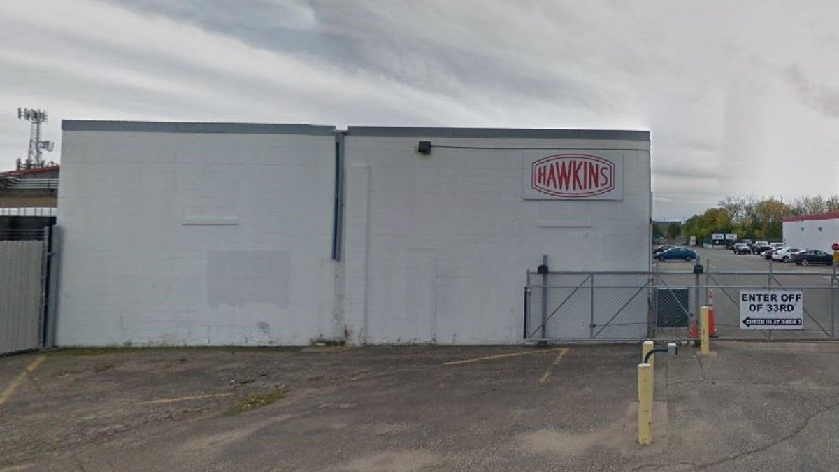 A total of 5,700 gallons of nitric acid at Hawkins Chemical were spilled on Friday morning, reports said.
