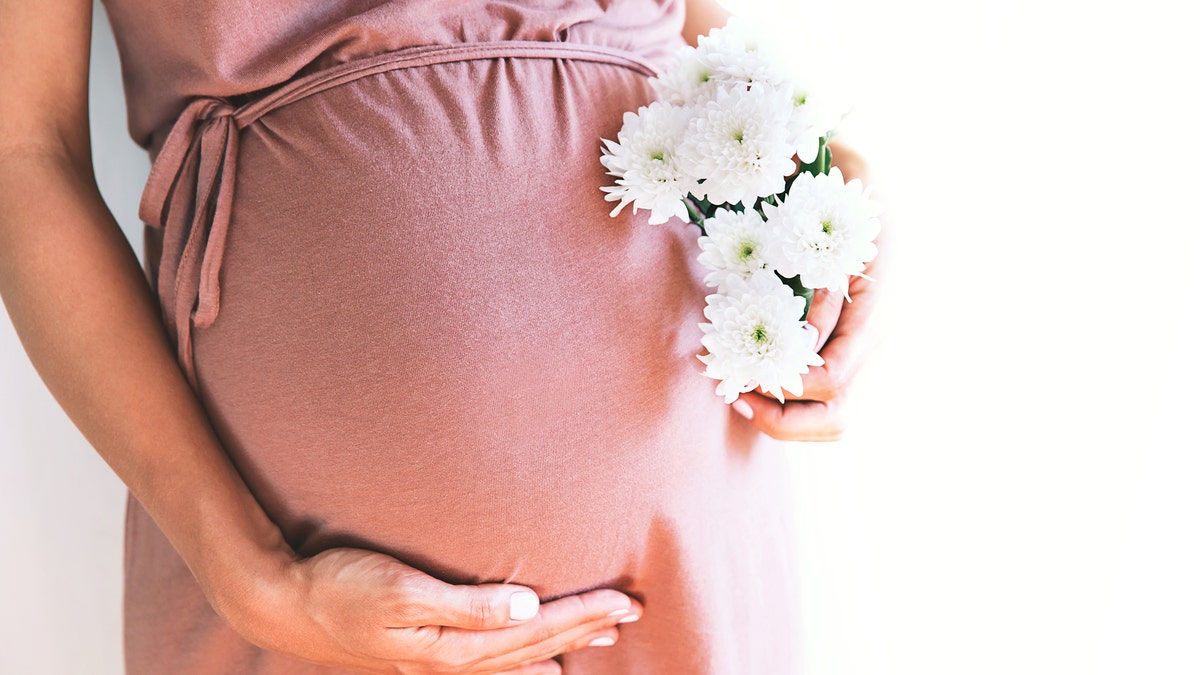 “Now I'm annoyed because I paid a lot of money for a wedding photo shoot, not maternity pics. But I don't know, am I the a—h---?” the bride asked in the online forum.