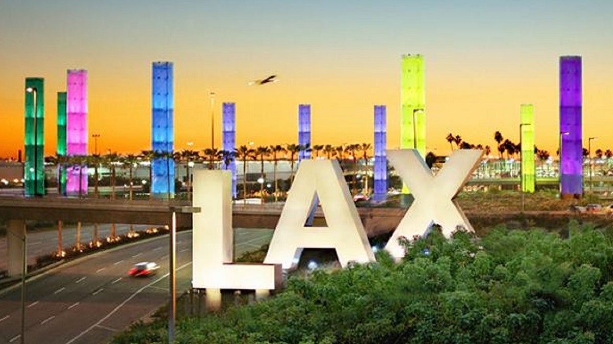 Lightning on Tuesday night caused a power outage at Los Angeles International Airport and forced a plane to return to the airport after being struck by lightning, officials said.