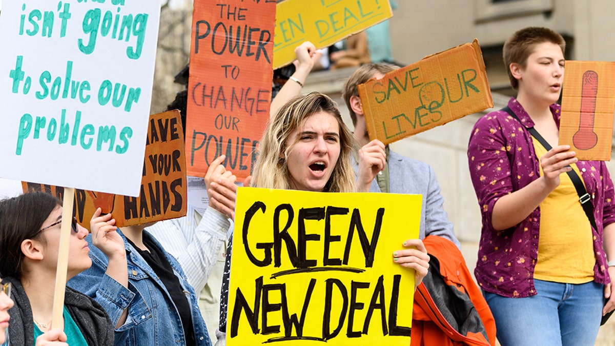 NEW YORK, NY, UNITED STATES - Demonstrators seen holding placards during the Climate Strike at Columbia University in New York City, NY. (Photo by Michael Brochstein/SOPA Images/LightRocket via Getty Images)