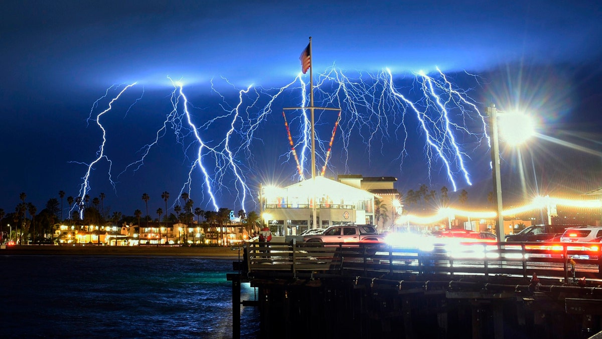 This time exposure photo provided by the Santa Barbara County Fire Department shows a series of lightning strikes over Santa Barbara, Calif., seen from Stearns Wharf in the city's harbor, Tuesday evening, March 5, 2019.
