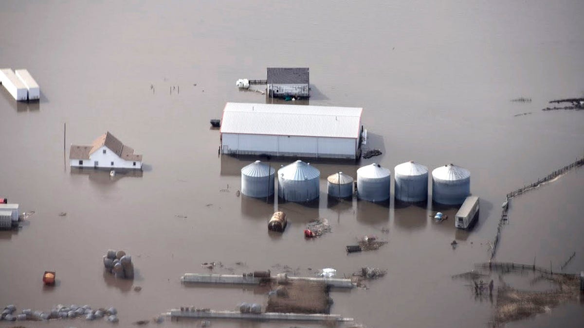 This March 18, 2019 photo taken by the South Dakota Civil Air Patrol and provided by the Iowa Department of Homeland Security and Emergency Management, shows flooding along the Missouri River in rural Iowa north of Omaha, Neb. Nearly 6 million more properties are at risk for flooding than FEMA estimates in a new analysis.