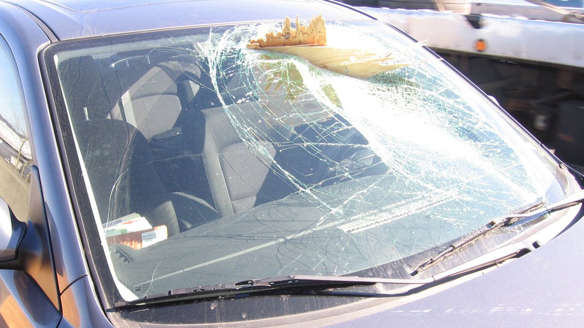 The plywood fell from a truck and struck Christopher Mathenson's car as he was traveling at about 60 mph on a highway.