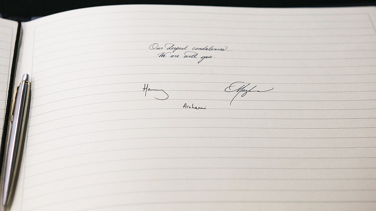 LONDON, ENGLAND - MARCH 19: Meghan, Duchess of Sussex and Prince Harry, Duke of Sussex sign a book of condolence on behalf of The Royal Family at New Zealand House on March 19, 2019 in London, England. The visit was following the recent terror attack which saw at least 50 people killed at a Mosque in Christchurch. (Photo by Ian Vogler -WPA Pool/Getty Images)