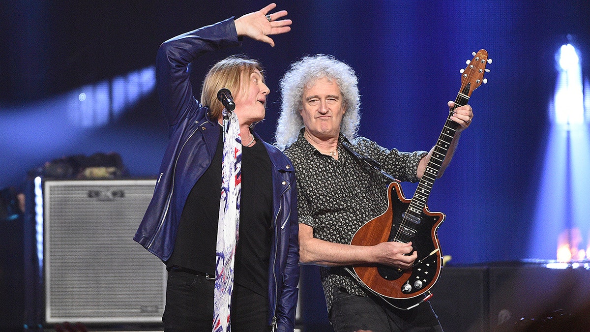 Inductee Joe Elliott, of Def Leppard, left, performs with Brian May, of Queen, at the Rock &amp; Roll Hall of Fame induction ceremony at the Barclays Center on Saturday, March 30, 2019, in New York. (Photo by Evan Agostini/Invision/AP)