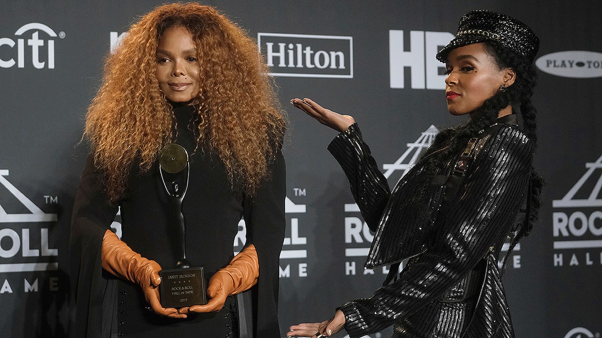 Inductee Janet Jackson, left, holds her trophy as she poses in the press room with Janelle Monae at the Rock & Roll Hall of Fame induction ceremony at the Barclays Center on Friday, March 29, 2019, in New York. (Photo by Charles Sykes/Invision/AP)