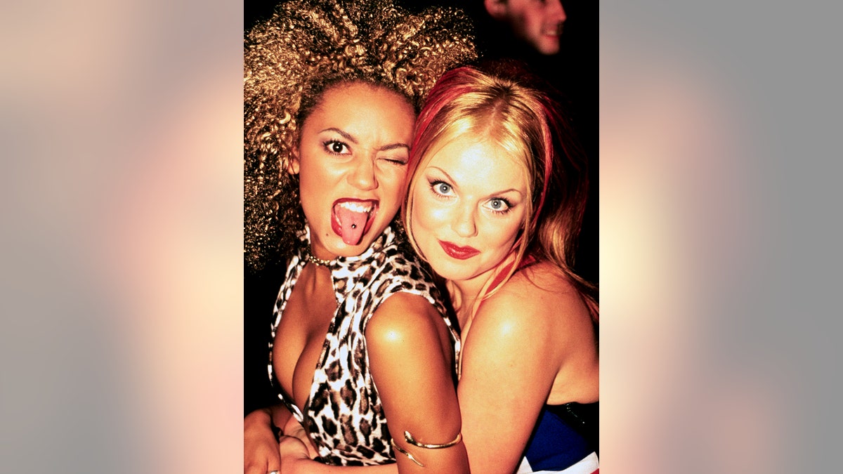 Mel B and Geri Halliwell (Scary and Ginger) of the Spice Girls photographed backstage at the Brit Awards in February 1997.; (Photo by Ray Burmiston/Photoshot/Getty Images)