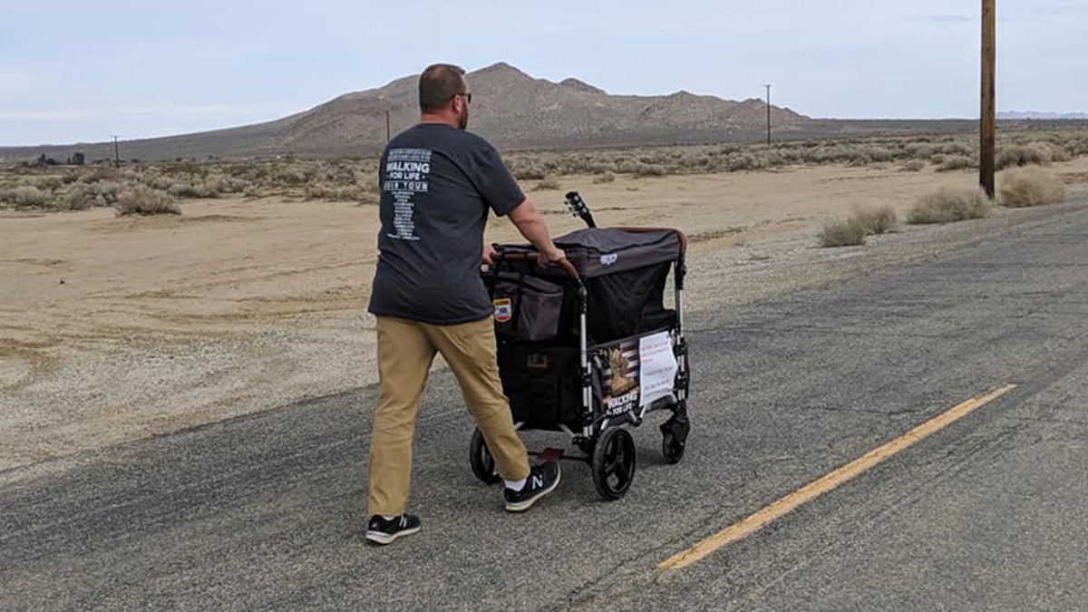Retired veteran Van Booth walks a highway in Nevada to help veterans in need. So far he's walked 114 miles.
