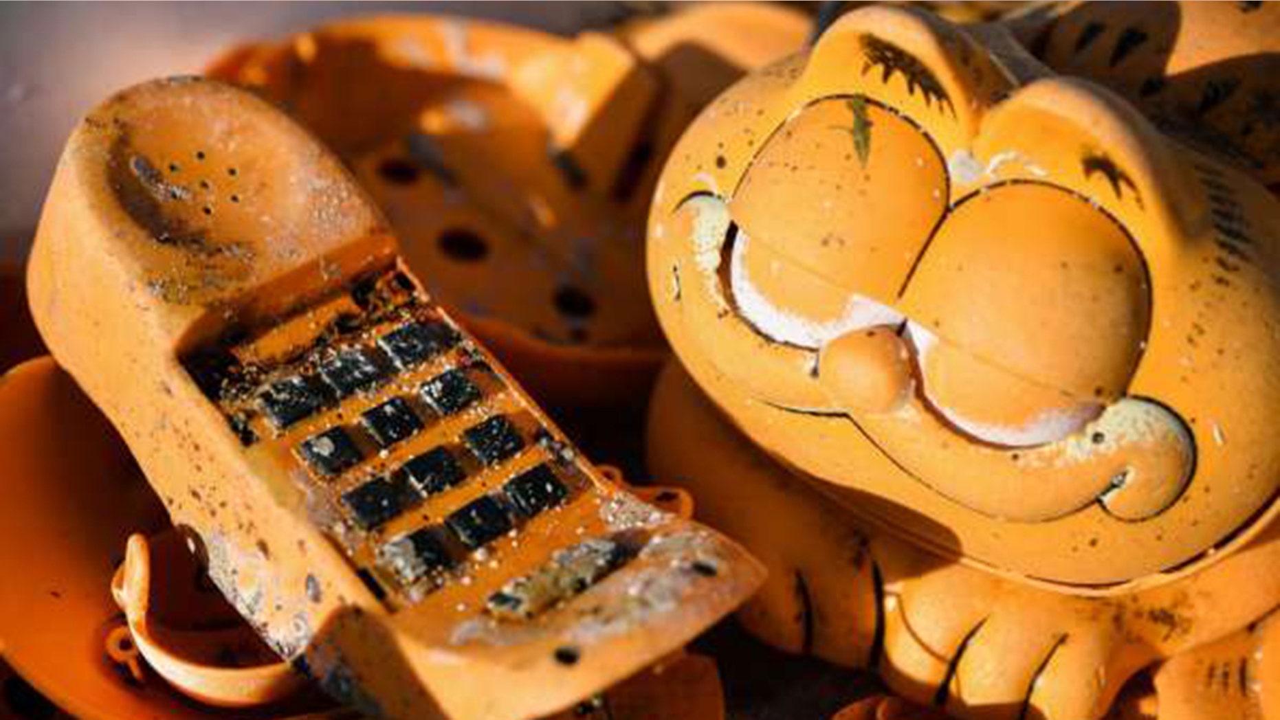 The Mystery of Plastic Garfield Telephones Washing Up on French Beaches