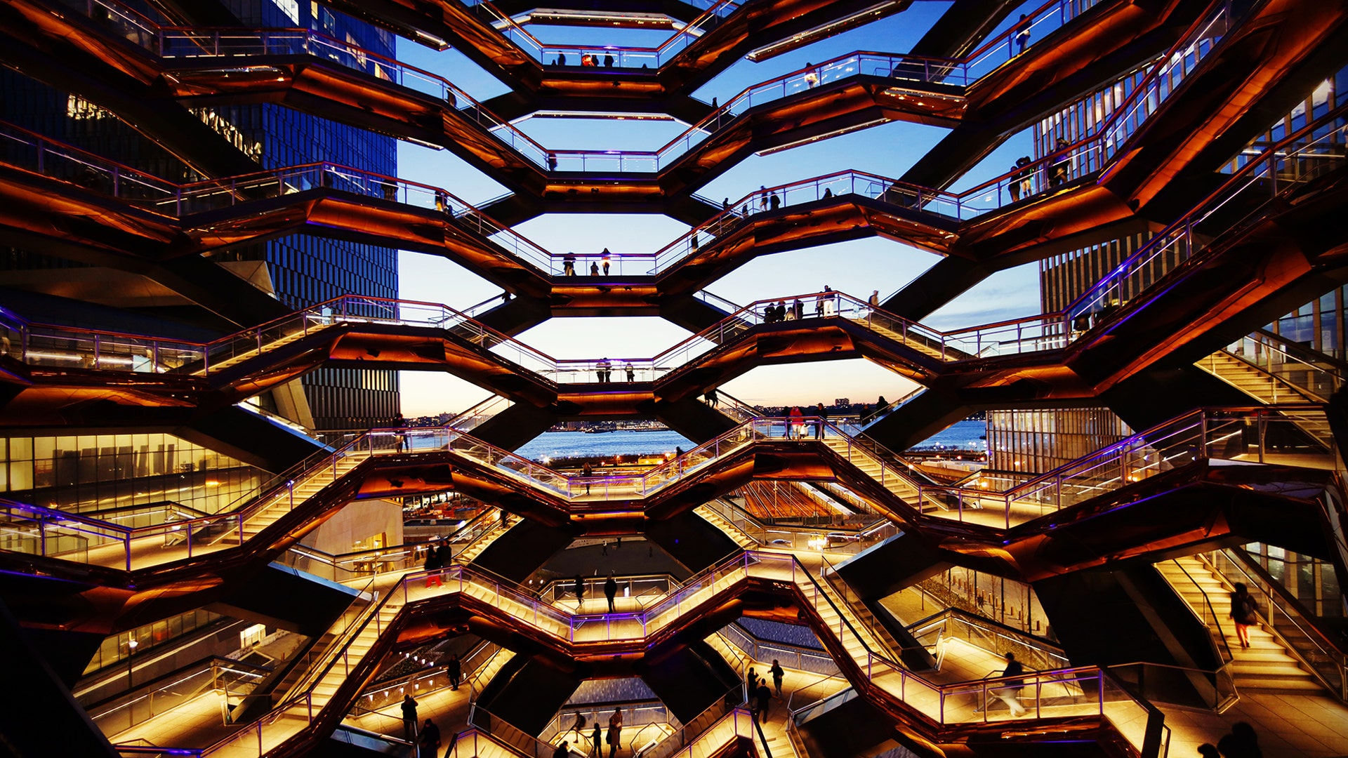 People visit the Vessel at Hudson Yards as the sun sets in New York City, March 27, 2019.
