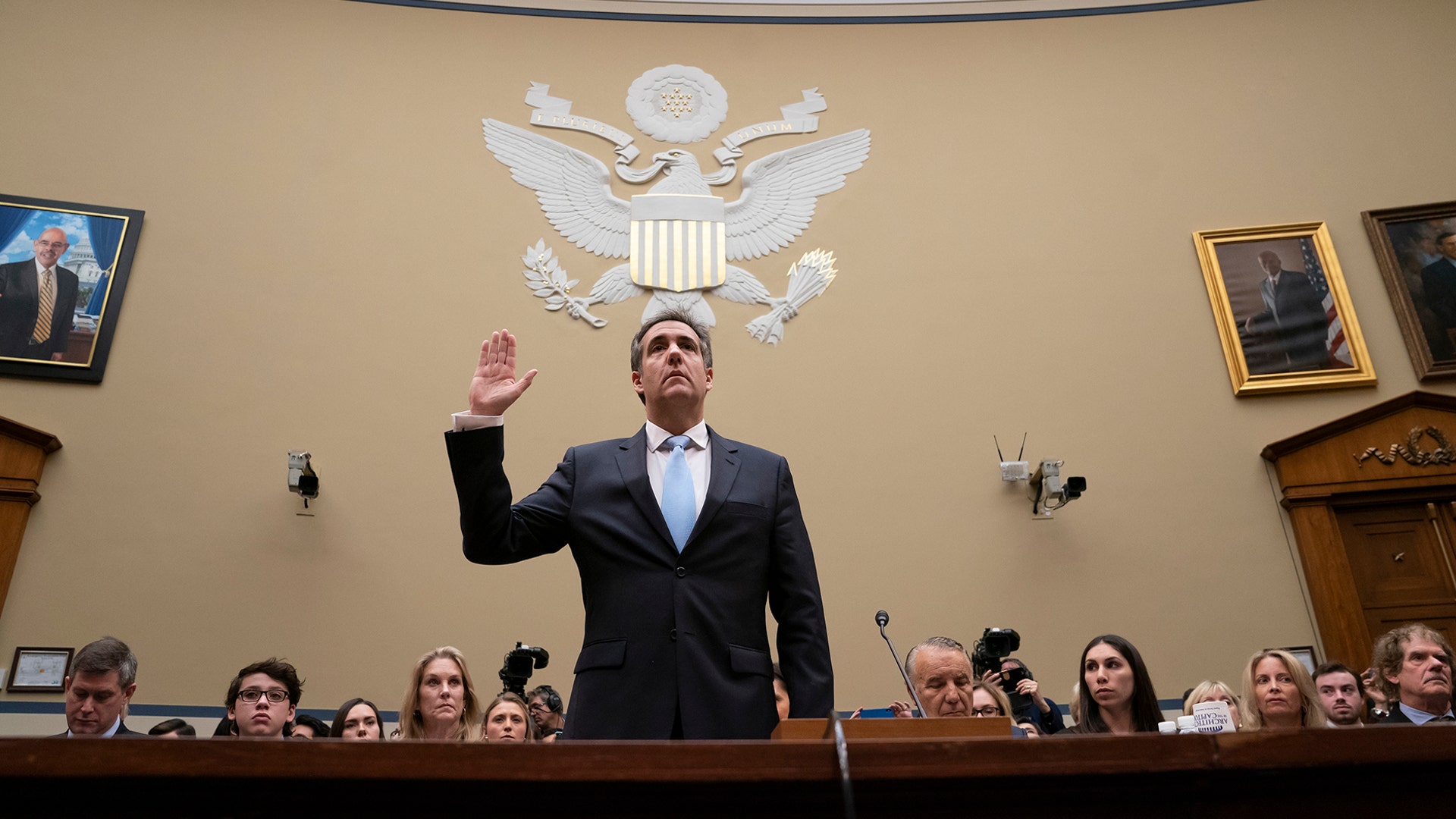 Michael Cohen, President Donald Trump's former personal lawyer, is sworn in to testify on Capitol Hill in Washington, Feb. 27, 2019. 