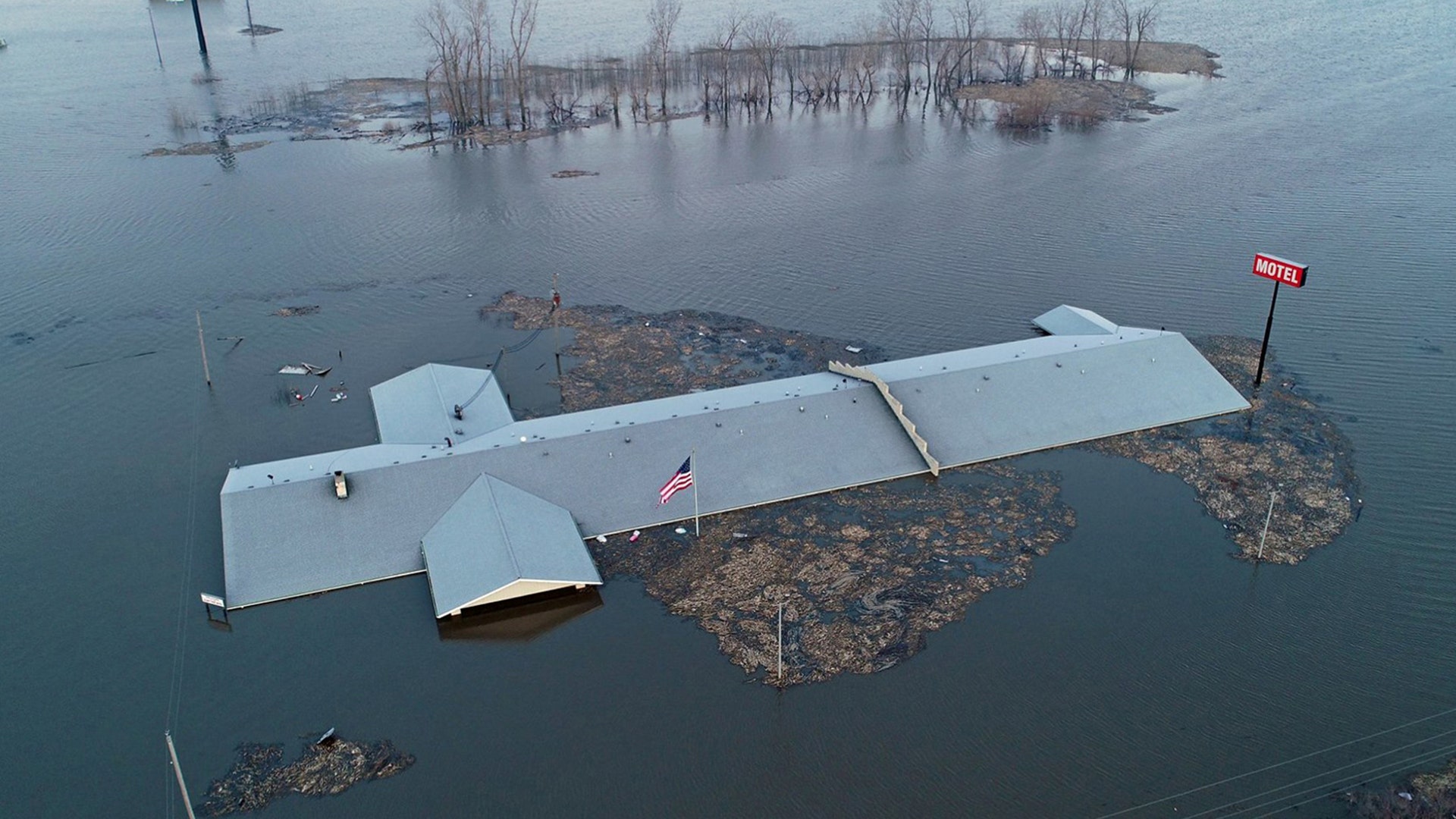 The roof of the Bluff View Motel is seen during the flooding of the Missouri River near Glenwood, Iowa, March 18, 2019. 