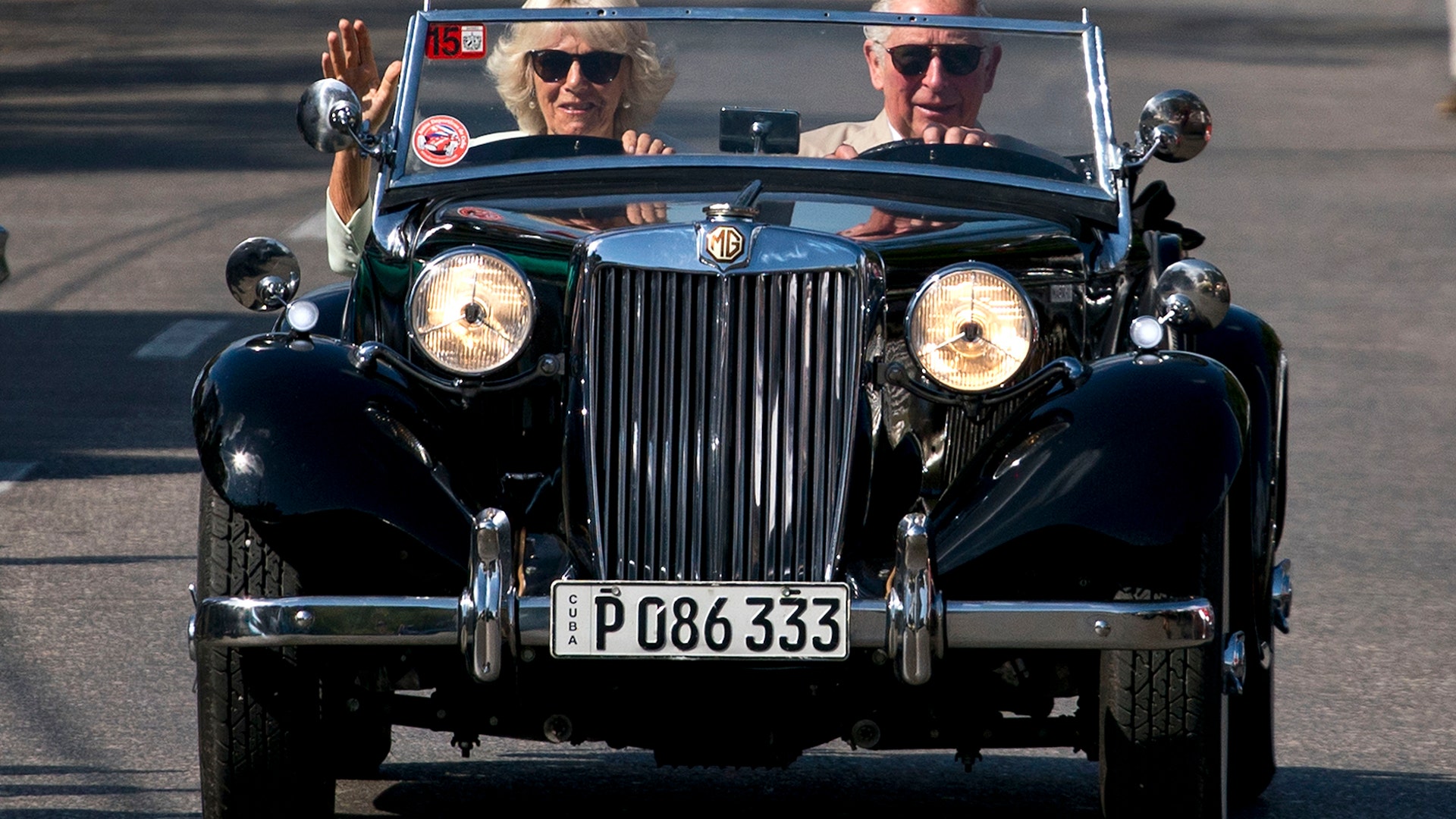 Prince Charles drives a vintage car with his wife Camilla, Duchess of Cornwall in Havana, Cuba, March 26, 2019. 