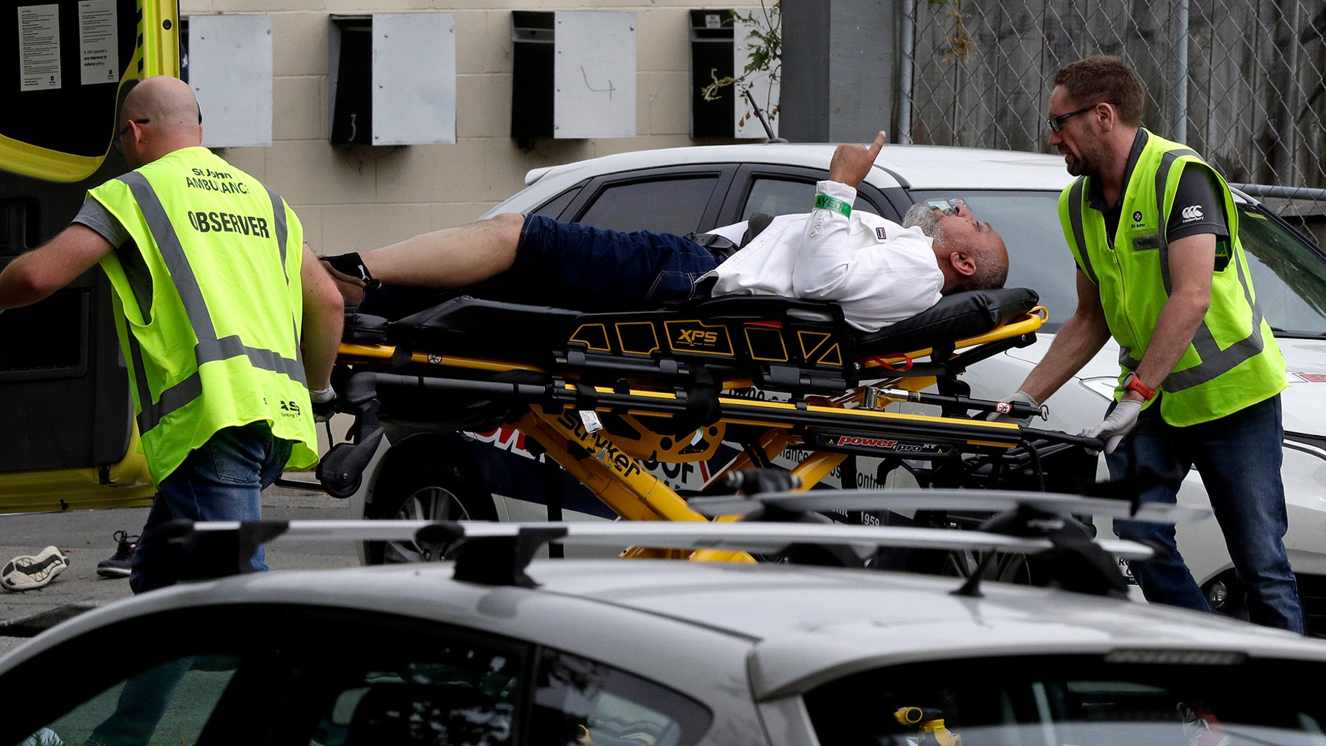 Ambulance staff takes a man from a mosque following a shooting in Christchurch, New Zealand, March 15, 2019. 