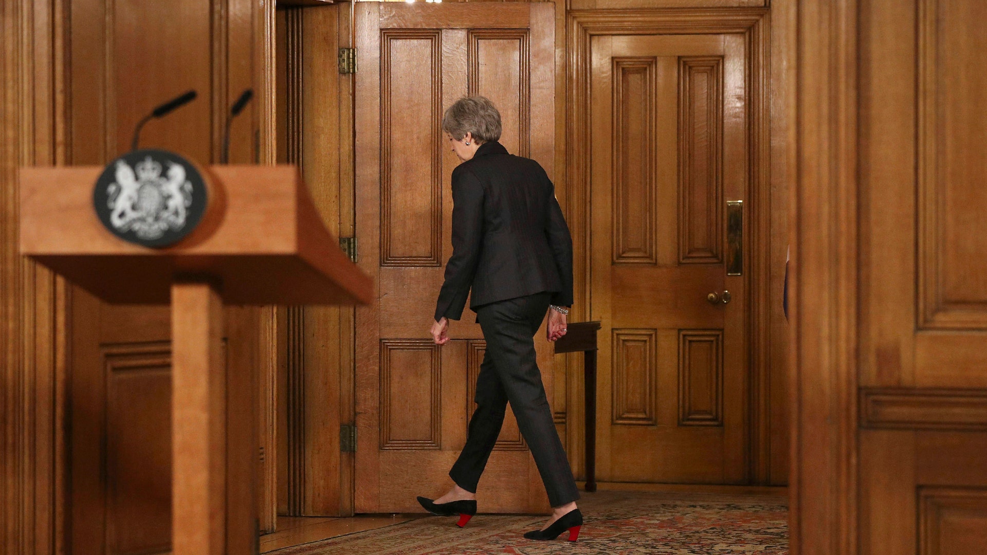 Britain's Prime Minister Theresa May leaves after making a Brexit statement at 10 Downing Street, in London, March 20, 2019. 