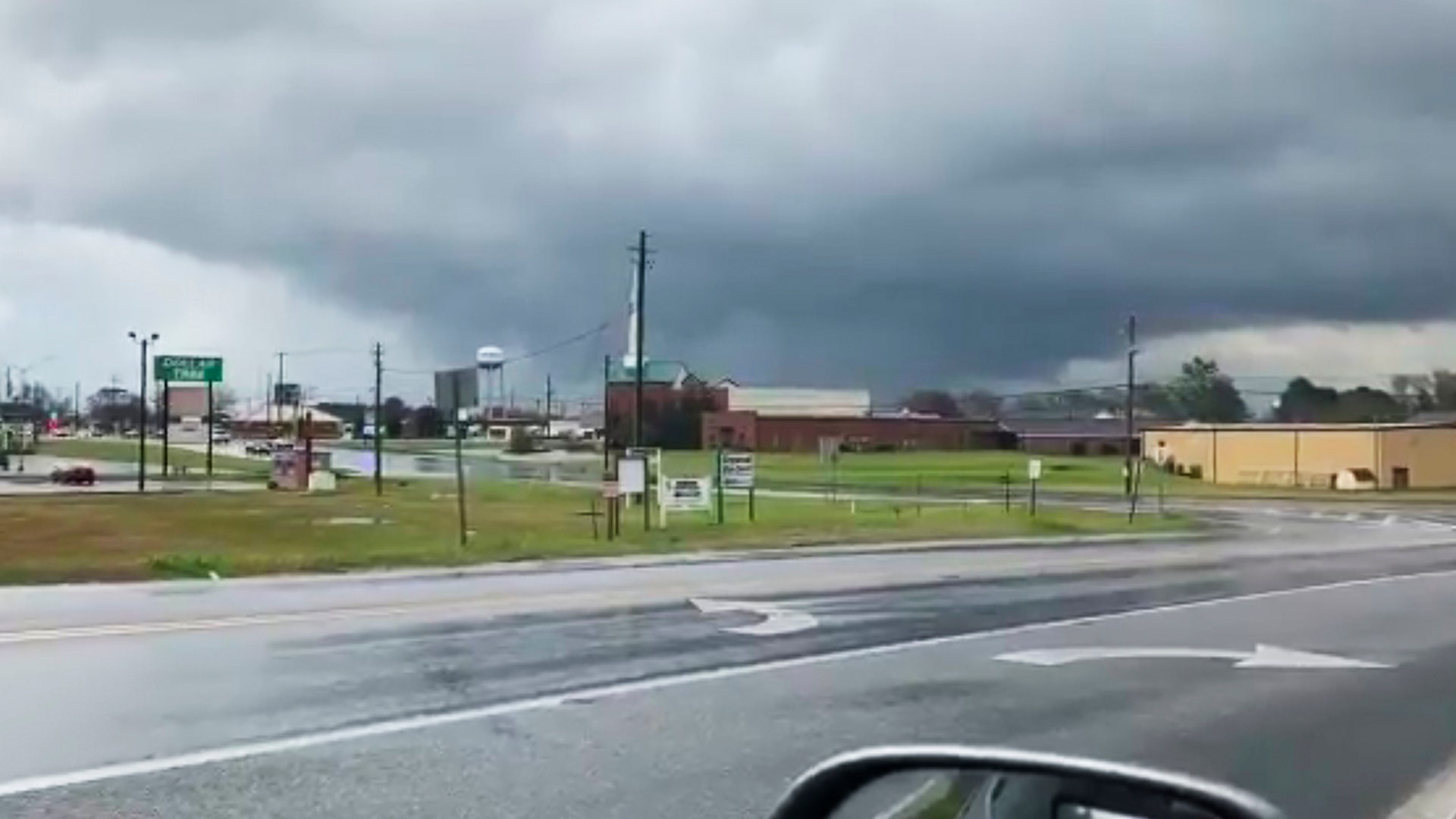 A funnel cloud can be seen in Byron, Ga., Sunday, March 3. The National Weather Service on Sunday issued a series of tornado warnings stretching from Phenix City, Ala., near the Georgia state line to Macon, Ga., about 100 miles to the east. 
