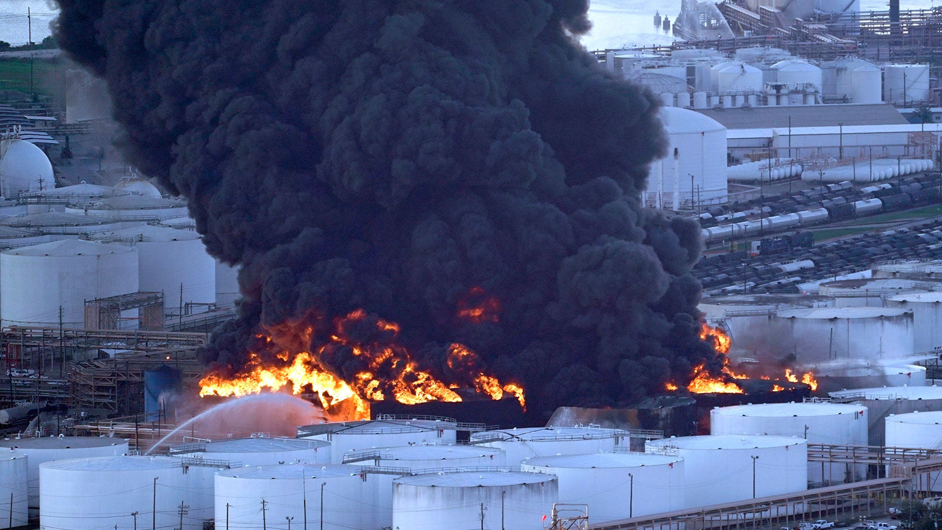 Firefighters battle a petrochemical fire at the Intercontinental Terminals Company in Deer Park, Texas, March 18, 2019.