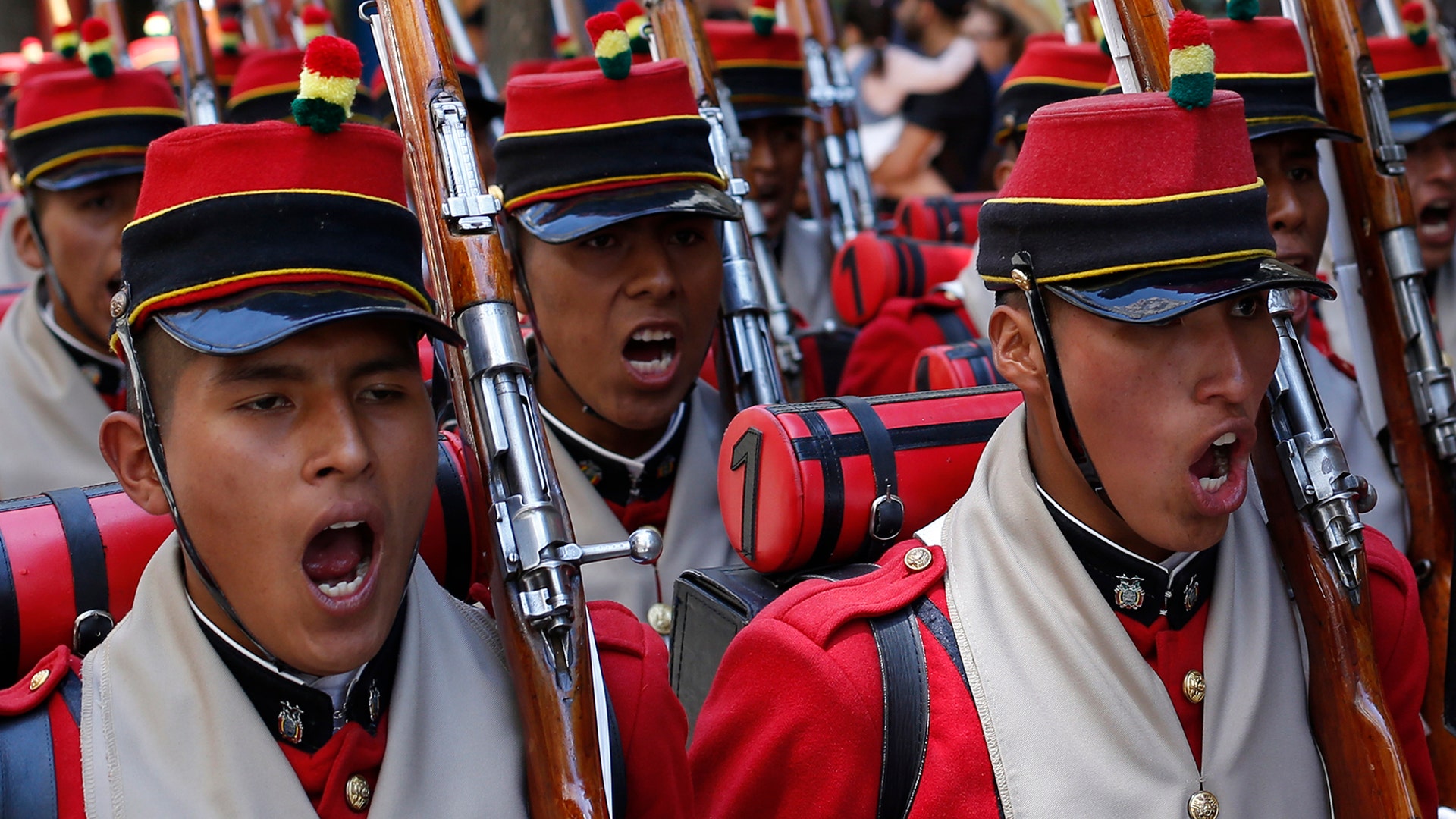 Bolivia's "Batallon Colorados," sing the national anthem during an event honoring national hero Eduardo Abaroa, who died in the 1879-1883 War of the Pacific, as part of Sea Day celebrations in La Paz, Bolivia, March 23, 2019. 