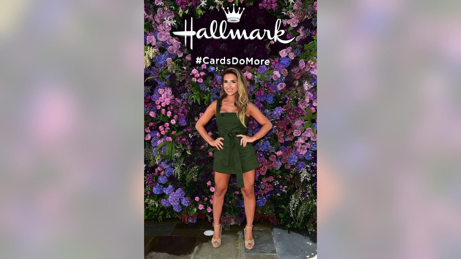 Jessie James Decker, rocking a green mini, teamed up with Hallmark to show how cards do more at the "Cards Do More" campaign launch in Los Angeles on March 21, 2019. 