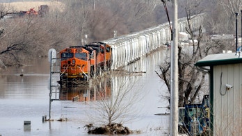 Deadly Midwest floods trigger new evacuations; at least 2 missing