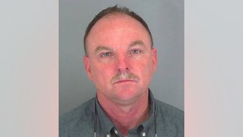 Former medal-winning police officer charged with sex crimes involving minors, authorities say