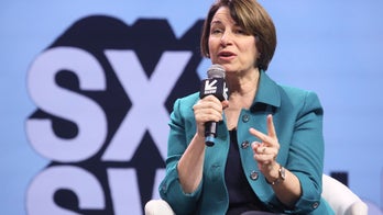Amy Klobuchar backs 'Green New Deal,' promises executive action on gun control in first 100 days