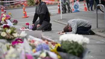 Ardern vows to deny accused mosque gunman notoriety he seeks