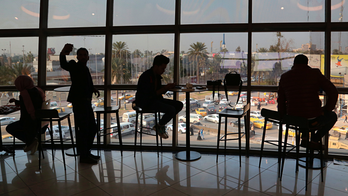 Across Baghdad, a moment of respite and guarded hope