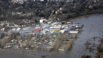 Flooding damage extensive in Midwest and more rain forecast