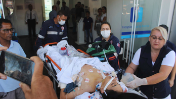 Brazil wonders why after school shooters kill 8, themselves