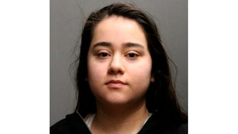 Chicago police officer shot in shoulder while serving warrant; 19-year-old woman charged