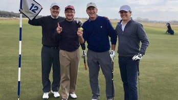Former President George W. Bush cheers first hole-in-one