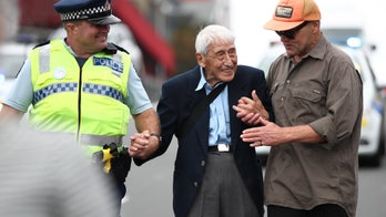 WWII veteran, 95, takes four buses to march after New Zealand mosque shootings