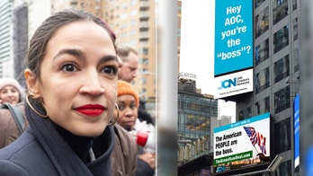 AOC slammed-again-on billboards posted in New York City