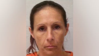 Woman used T-shirt gun to launch contraband over Oklahoma prison fence, authorities say