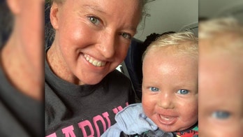 American Airlines apologizes to mom, baby kicked off flight for skin condition  