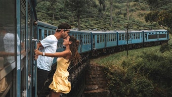 Instagram couple slammed for 'dangerous' photo shoot outside moving train