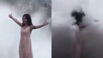Tourist in Bali nearly swept away by massive wave in wild viral video
