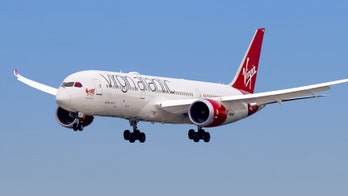 Virgin Atlantic passengers quarantined at London airport after travelers begin 'feeling unwell onboard'