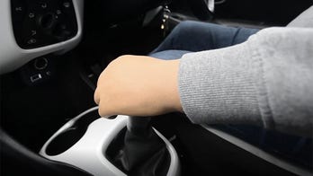 One-armed driving instructor teaches stick-shift skills