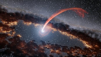 Aliens might shoot lasers at black holes to travel the galaxy