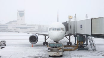 Denver airport closes all runways after canceling over 1,300 flights amid severe weather