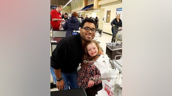 Mom thanks grocery cashier for special moment with young daughter in viral video