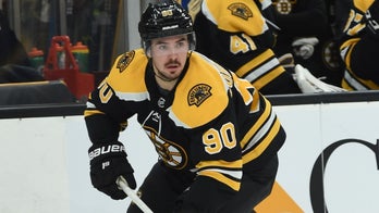 Boston Bruins’ Marcus Johansson hospitalized after suffering in-game hit from Carolina Hurricanes Micheal Ferland