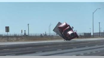 SEE IT: Strong winds blow over tractor-trailer traveling in Texas